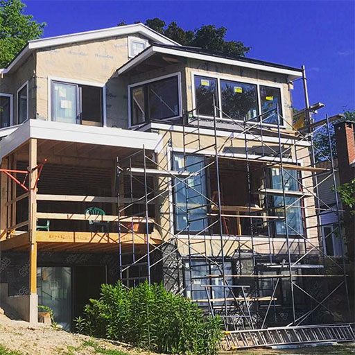 Scaffolding Outside Home Of Spray Foam Project