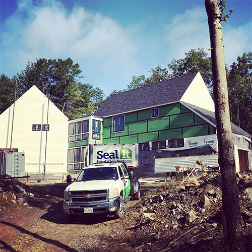 Seal It Trucks Outside Home Spray Foam Project